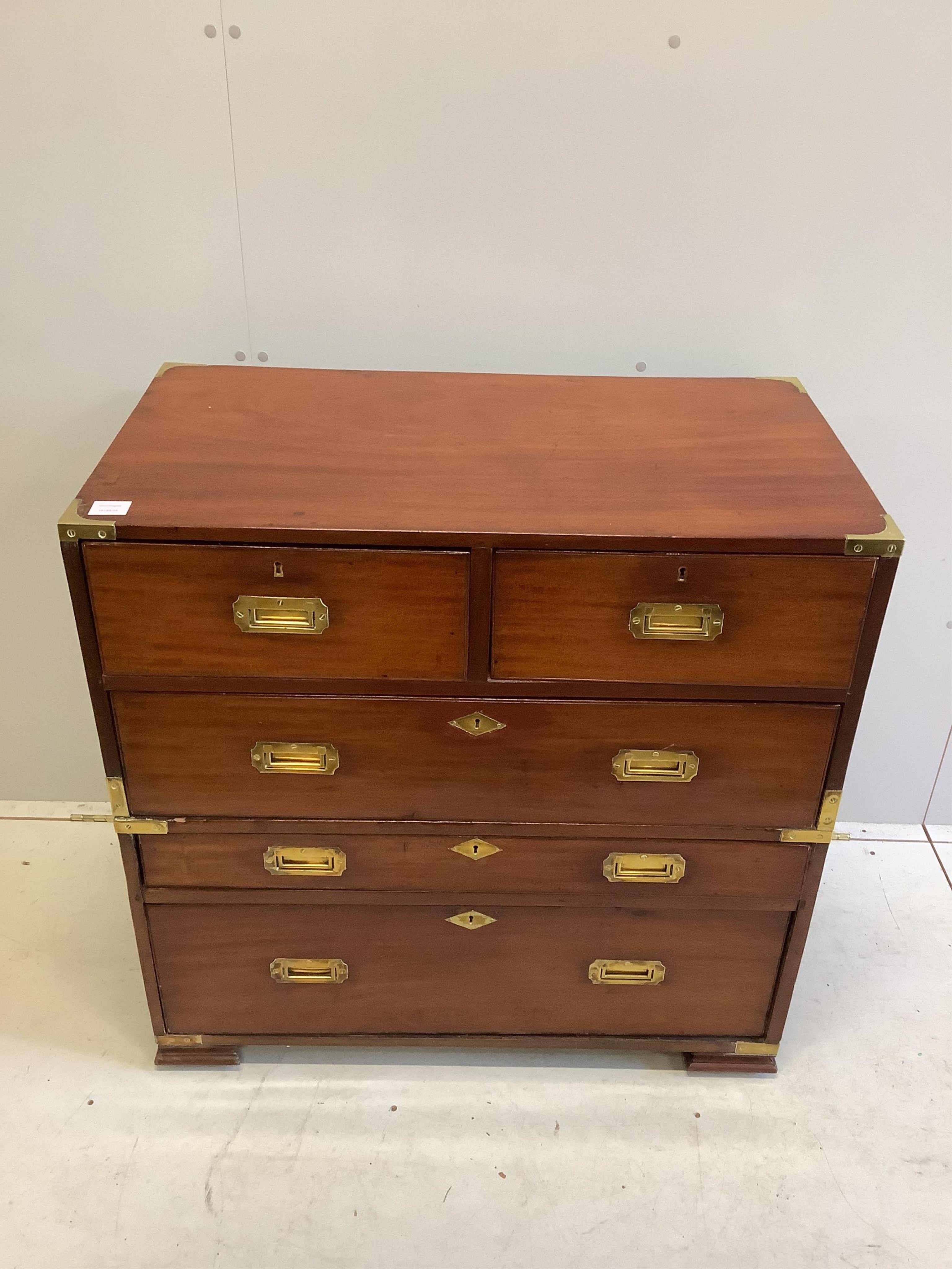 A 19th century military style mahogany two part chest, width 91cm, depth 50cm, height 90cm. Condition - fair to good